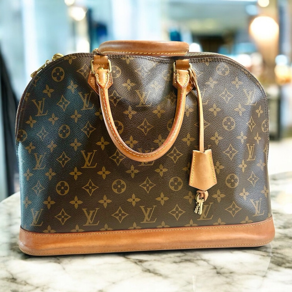 Louis Vuitton EXTRA LARGE RARE Alma Tote bag with bottom studs Authentic